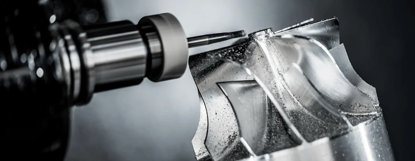 Wide view of CNC machining centres on a precision manufacturing floor